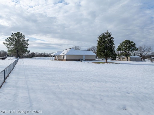 view of yard covered in snow