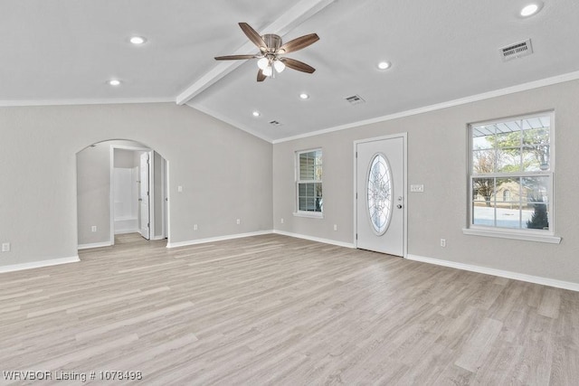 unfurnished living room featuring ceiling fan, light wood-type flooring, ornamental molding, and vaulted ceiling with beams