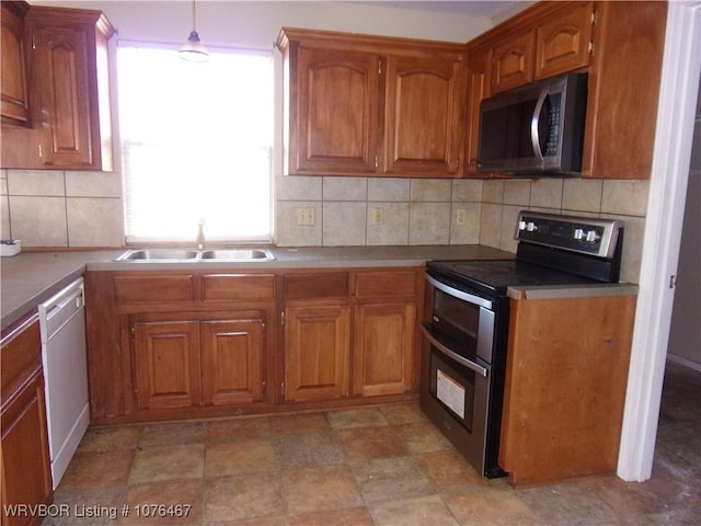 kitchen with dishwasher, backsplash, black range with electric stovetop, and sink