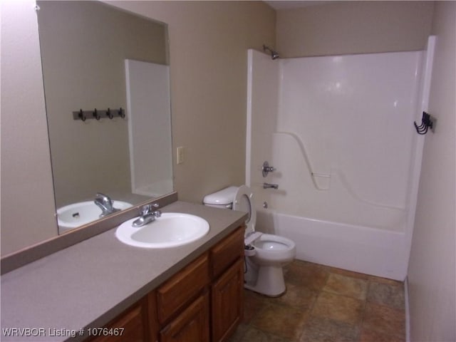 full bathroom featuring vanity, shower / bathtub combination, and toilet