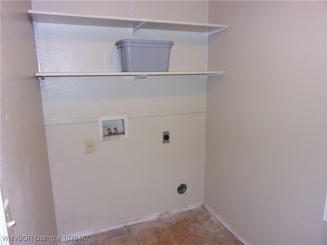 clothes washing area featuring hookup for a washing machine and hookup for an electric dryer