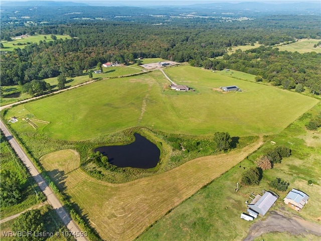 bird's eye view with a water view and a rural view