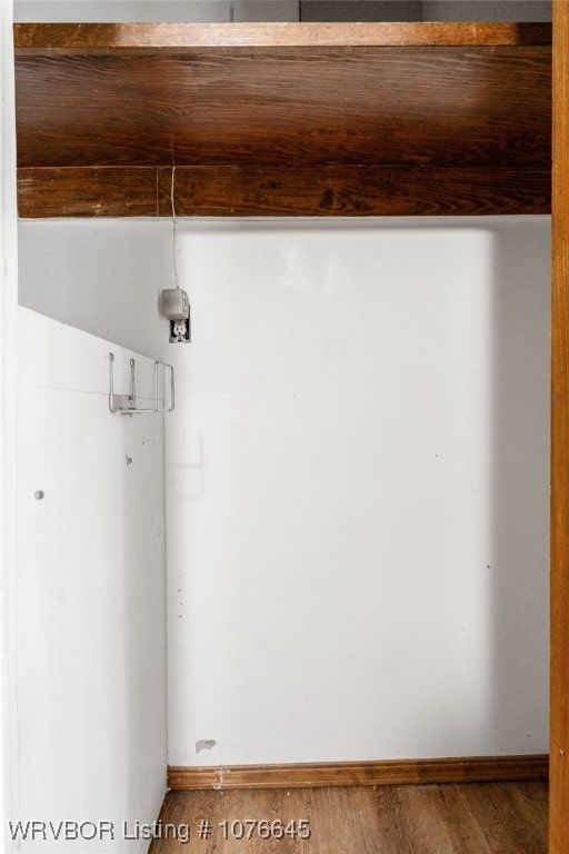 details with wood-type flooring