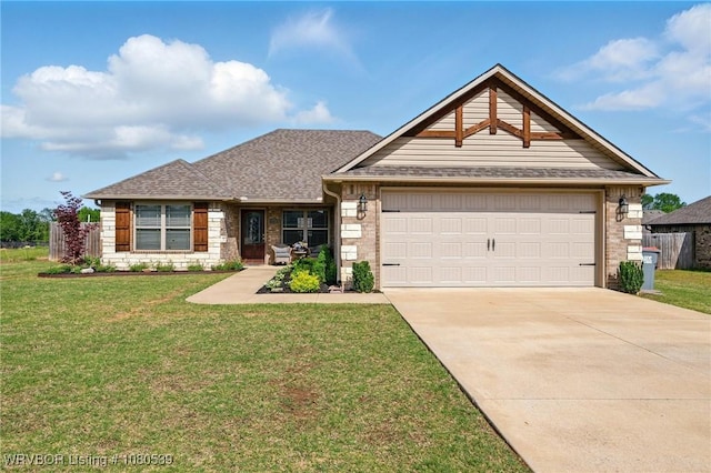 1026 Snow Goose Way, Barling, AR 72923 - view of front of property featuring concrete driveway, an attached garage, a shingled roof, and a front lawn