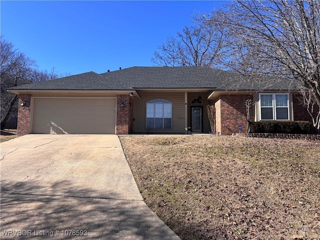 single story home with a garage