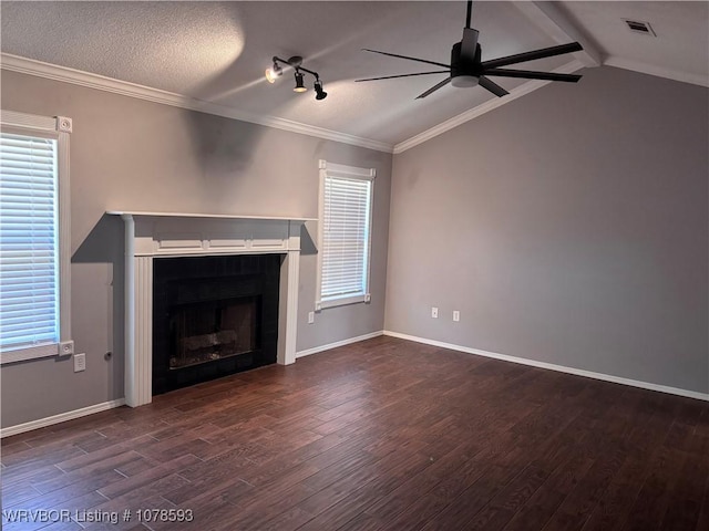 unfurnished living room with lofted ceiling, plenty of natural light, dark hardwood / wood-style floors, and ceiling fan