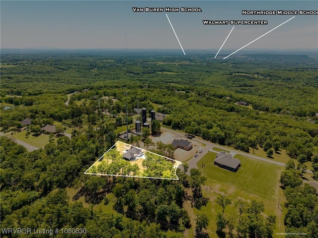 aerial view featuring a view of trees