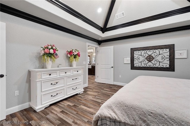 bedroom featuring visible vents, baseboards, and dark wood-style floors