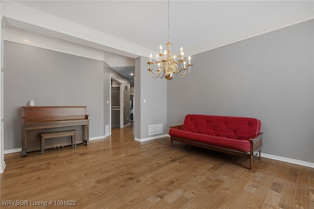 25 Shibley Rd, Van Buren, AR 72956 - living area with light wood finished floors, baseboards, a chandelier, and crown molding