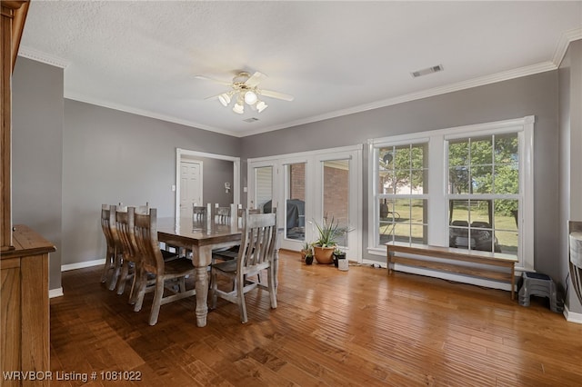 25 Shibley Rd, Van Buren, AR 72956 - dining area featuring ceiling fan, wood finished floors, baseboards, and ornamental molding