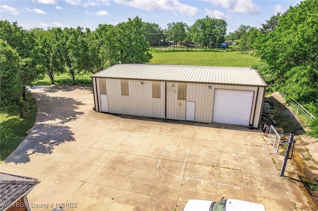25 Shibley Rd, Van Buren, AR 72956 - detached garage featuring view of wooded area