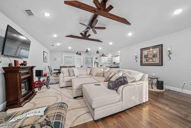 1024 Mourning Dove Way, Barling, AR 72923 - living area featuring wood finished floors, a ceiling fan, recessed lighting, and a glass covered fireplace
