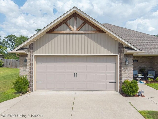 1024 Mourning Dove Way, Barling, AR 72923 - view of front of property featuring roof with shingles, concrete driveway, brick siding, and an attached garage