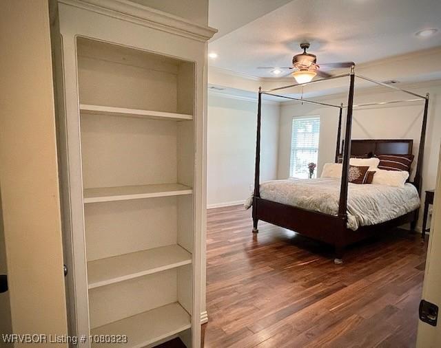 bedroom featuring wood finished floors, ceiling fan, and recessed lighting
