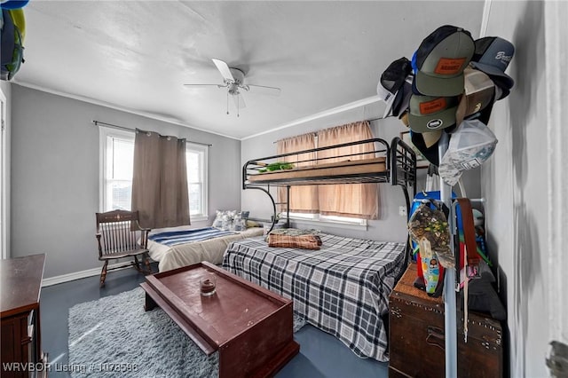 bedroom with ceiling fan and ornamental molding