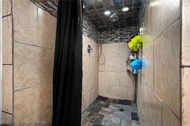 bathroom with a shower with curtain