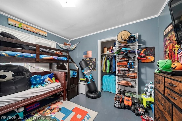 bedroom featuring ornamental molding and concrete floors