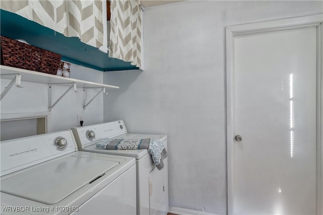 washroom with laundry area and washer and clothes dryer