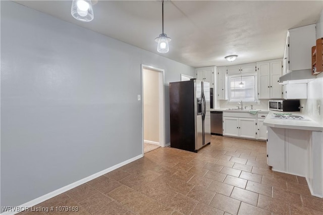 kitchen featuring stainless steel appliances, a sink, white cabinetry, baseboards, and light countertops