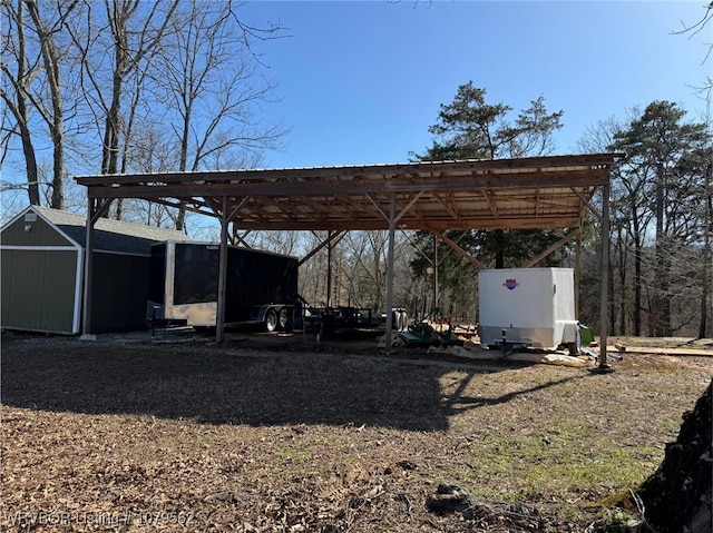 view of parking featuring a detached carport