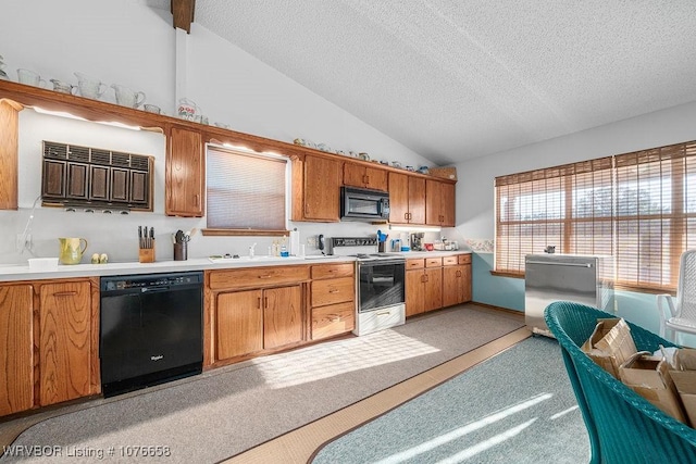 kitchen featuring sink, light colored carpet, a textured ceiling, vaulted ceiling, and black appliances