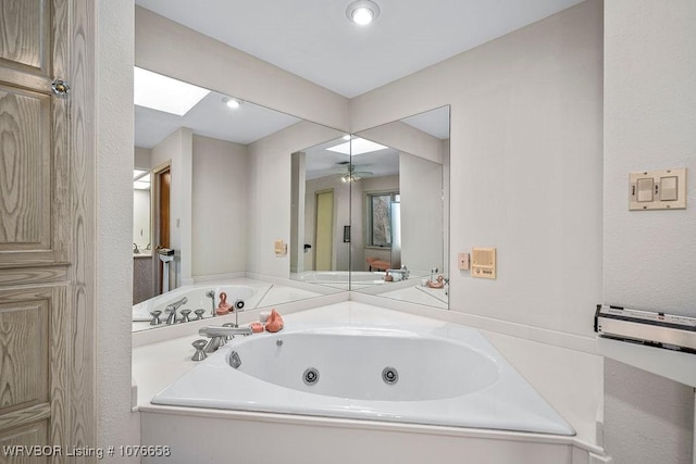 bathroom with a tub and sink