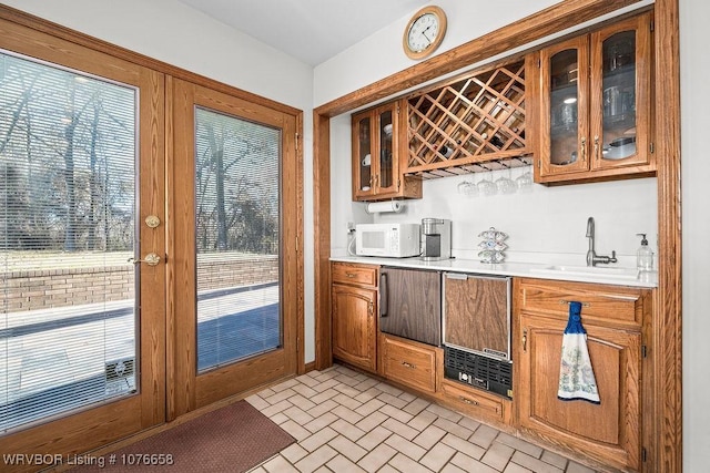 bar with a wealth of natural light and sink