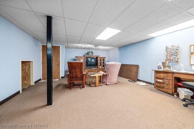 interior space with carpet flooring and a drop ceiling