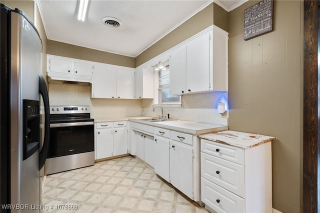 kitchen featuring white cabinetry, stainless steel appliances, and sink