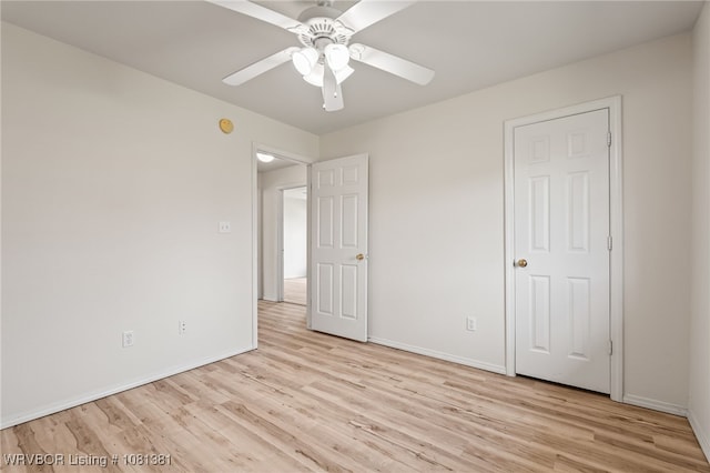 101 Saskatchewan Rd, Roland, OK 74954 - unfurnished bedroom featuring light wood-type flooring, baseboards, and ceiling fan