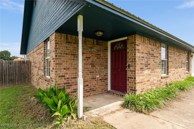101 Saskatchewan Rd, Roland, OK 74954 - doorway to property featuring brick siding