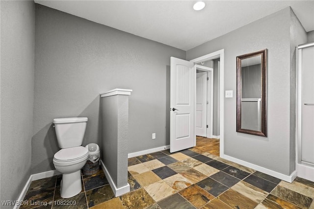 6106 Dean Rd, Alma, AR 72921 - bathroom with stone tile floors and a stall shower