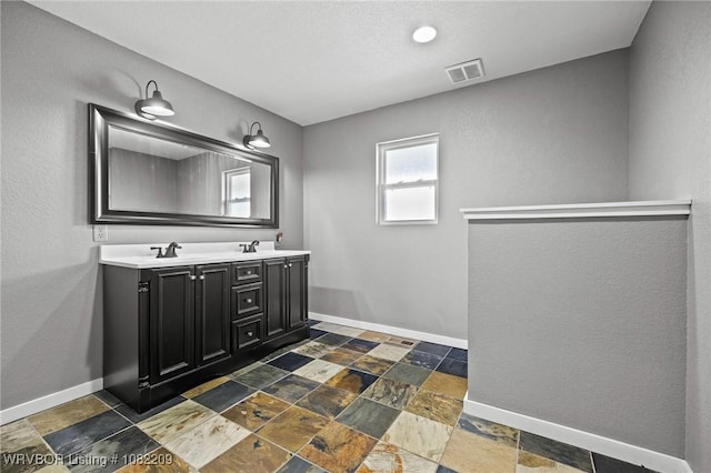 6106 Dean Rd, Alma, AR 72921 - full bath featuring stone tile floors and double vanity