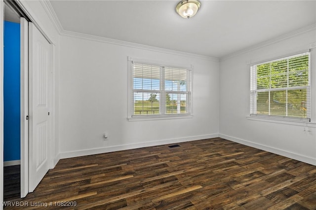 6106 Dean Rd, Alma, AR 72921 - unfurnished bedroom with ornamental molding, wood finished floors, and a closet