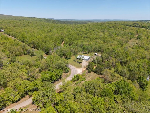 aerial view with a wooded view