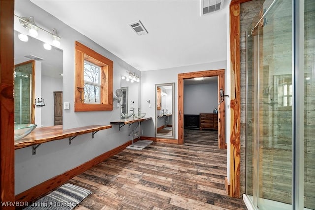 corridor featuring dark hardwood / wood-style flooring