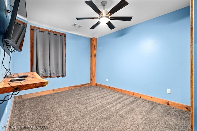 interior space with ceiling fan and carpet floors