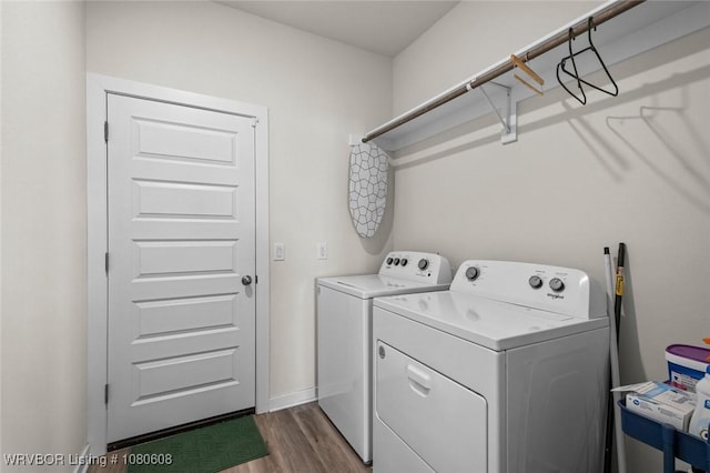 3912 Kent Ln, Springdale, AR 72764 - laundry area with washing machine and clothes dryer, laundry area, and wood finished floors