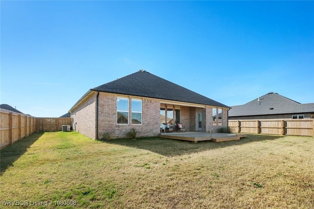 3912 Kent Ln, Springdale, AR 72764 - back of property featuring a lawn, central air condition unit, brick siding, and a fenced backyard