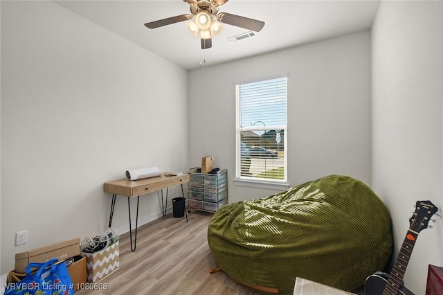 3912 Kent Ln, Springdale, AR 72764 - living area featuring a ceiling fan, baseboards, light wood-type flooring, and visible vents