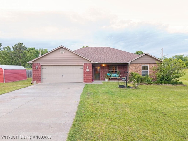 1917 Fisher Rd, Muldrow, OK 74948 - single story home with a garage, driveway, a front yard, and brick siding