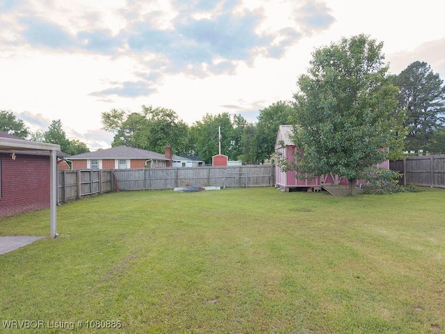 1917 Fisher Rd, Muldrow, OK 74948 - view of yard with a storage shed and an outdoor structure