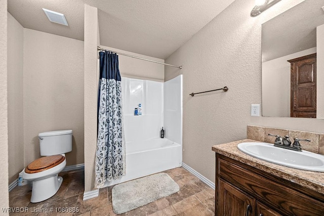 1917 Fisher Rd, Muldrow, OK 74948 - bathroom featuring a textured wall, toilet, baseboards, vanity, and shower / bath combination with curtain