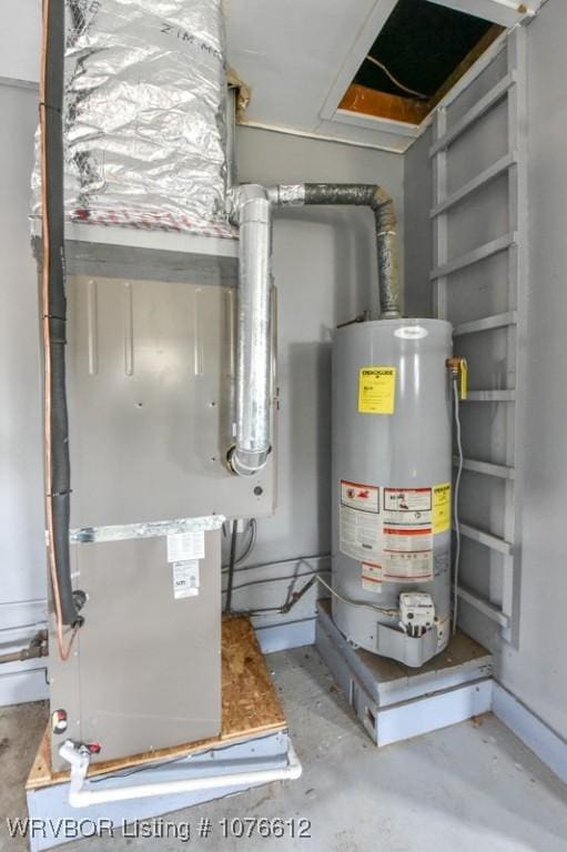 utility room featuring gas water heater