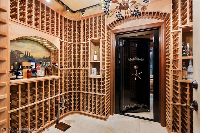 wine room featuring tile patterned floors