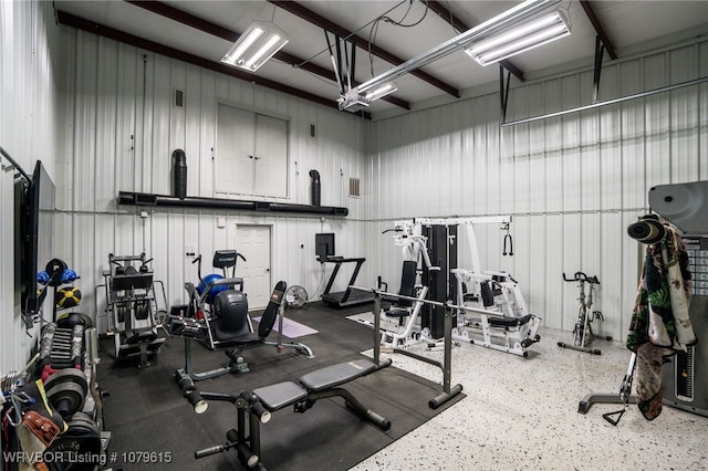 exercise room with metal wall