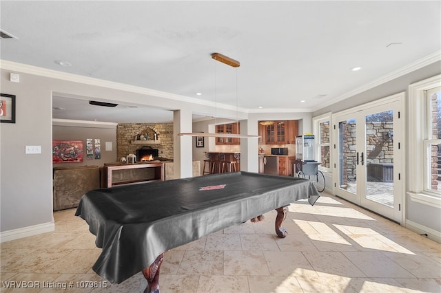 recreation room with pool table, crown molding, and baseboards