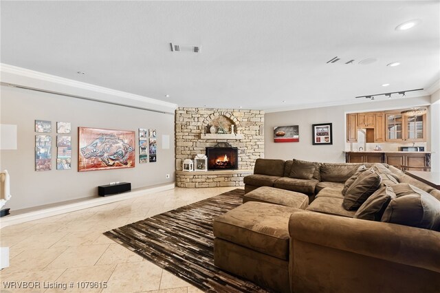 12034 Ridgefield Dr, Fort Smith, AR 72916 - living area featuring crown molding, a fireplace, recessed lighting, and baseboards
