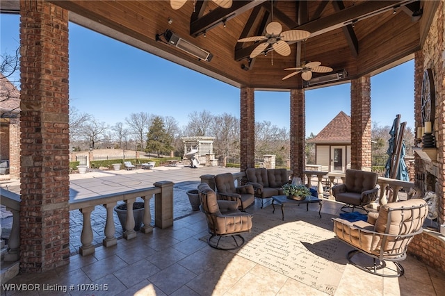 view of patio with a ceiling fan