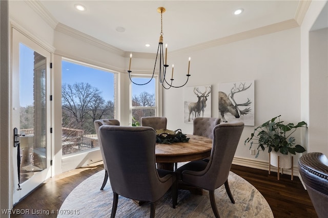 dining area featuring recessed lighting, crown molding, dark wood-type flooring, and baseboards